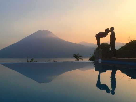Couple kissing at sunset