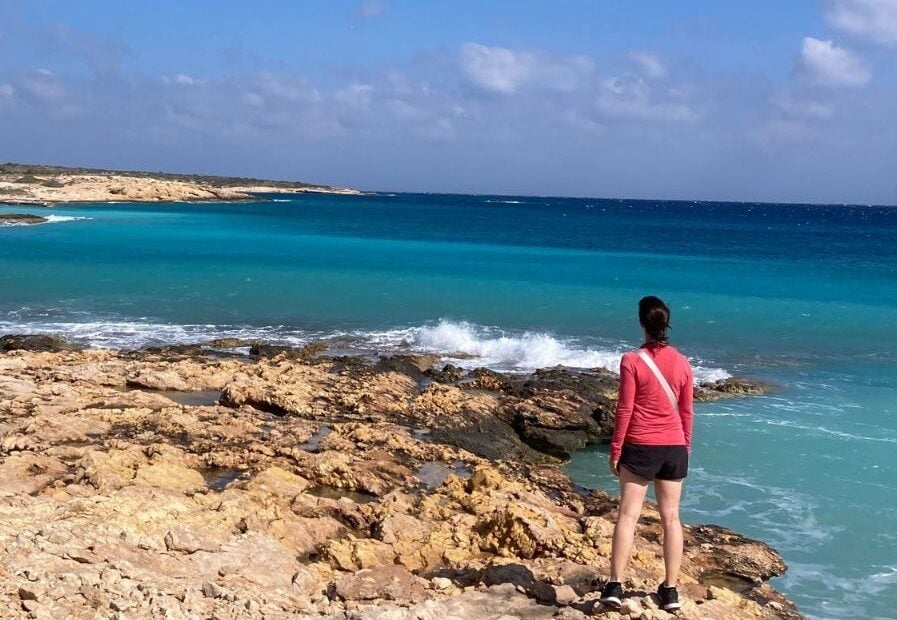 Person standing my ocean