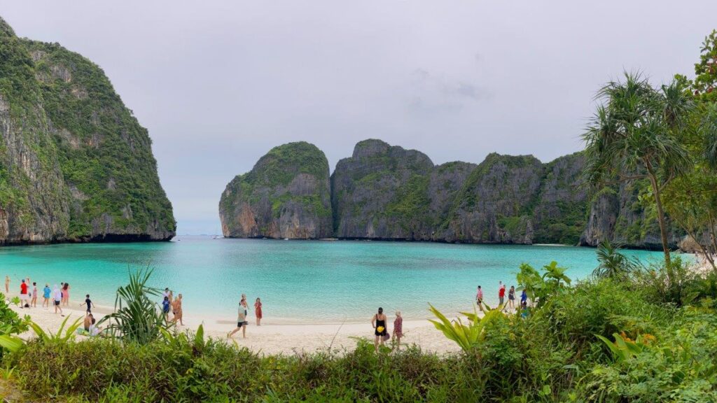 White sand beach, aquamarine water and limestone cliffs