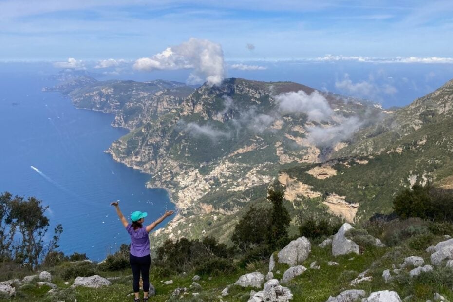 Woman posing on mountain overlooking the Amalfi Coast