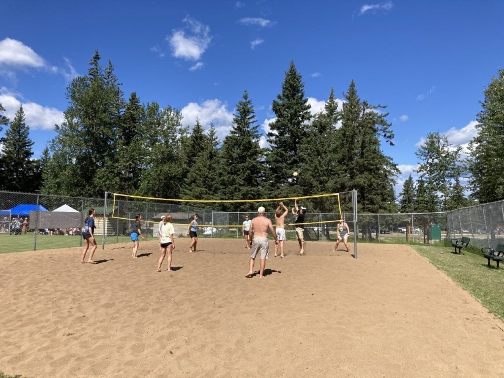 Group of people playing beach volleyball