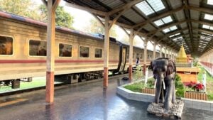 Train platform in Thailand with an elephant sculpture
