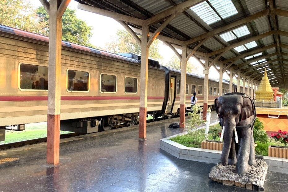 Train platform in Thailand with an elephant sculpture