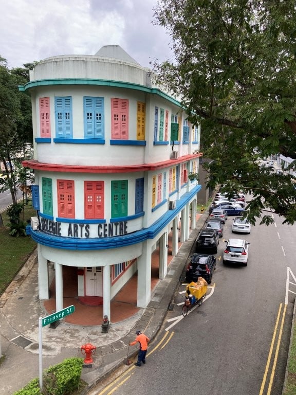 Pointy building with multi-coloured doors