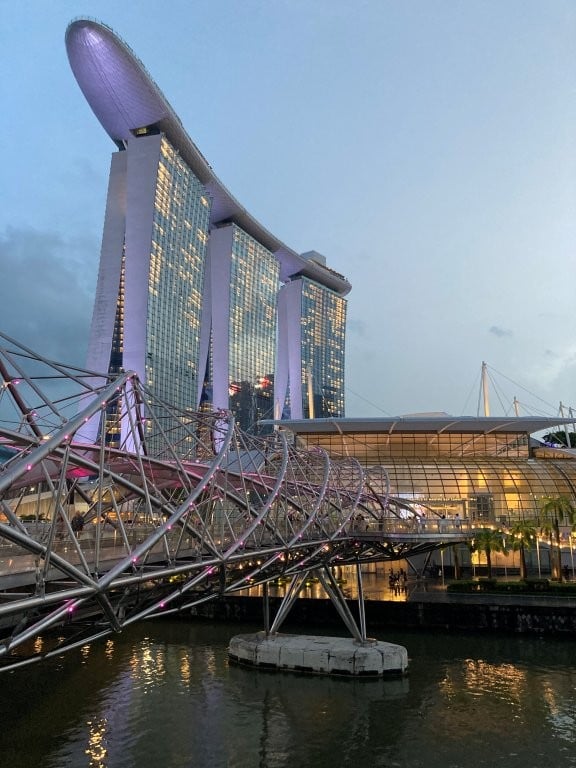Helix Bridge and Marina Bay Sands hotel at night