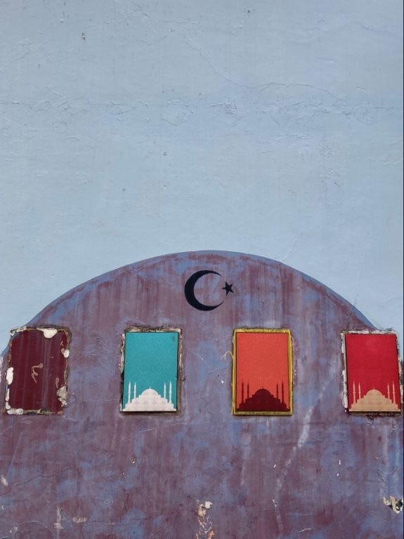 Blue wall with muslim symbols