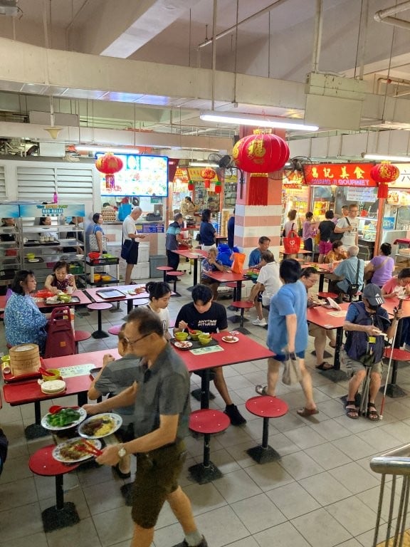 Busy food court in Chinatown Singapore