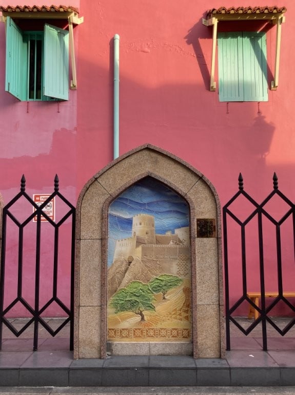 Pink building and desert street art