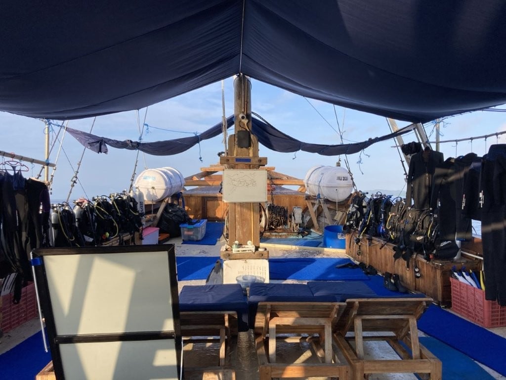 Dive equipment on the main deck of a Raja Ampat liveaboard