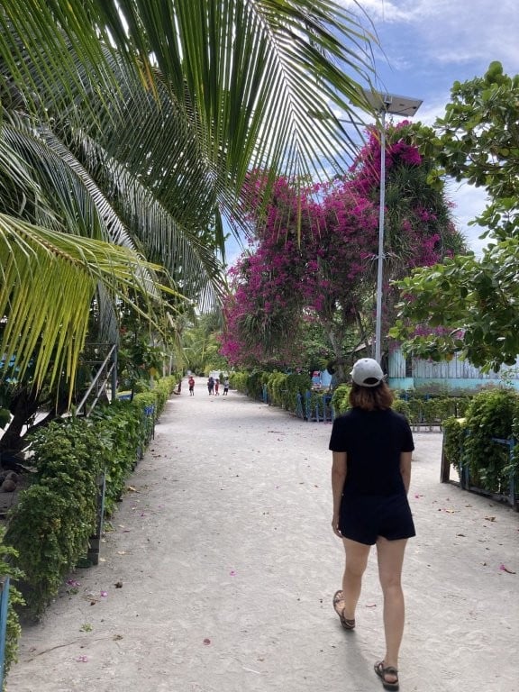 Woman walking in Indonesian village