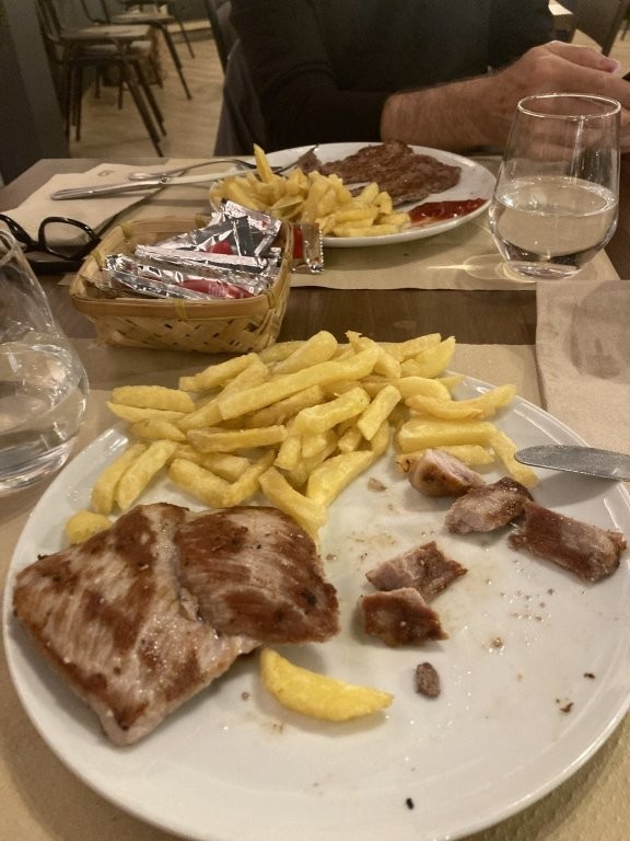Pork and french fries meal