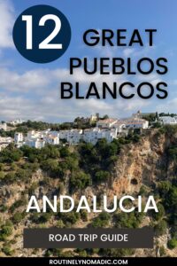 White village on rugged cliff for Pinterest