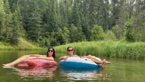Two women in inflatables on the Kingsmere River