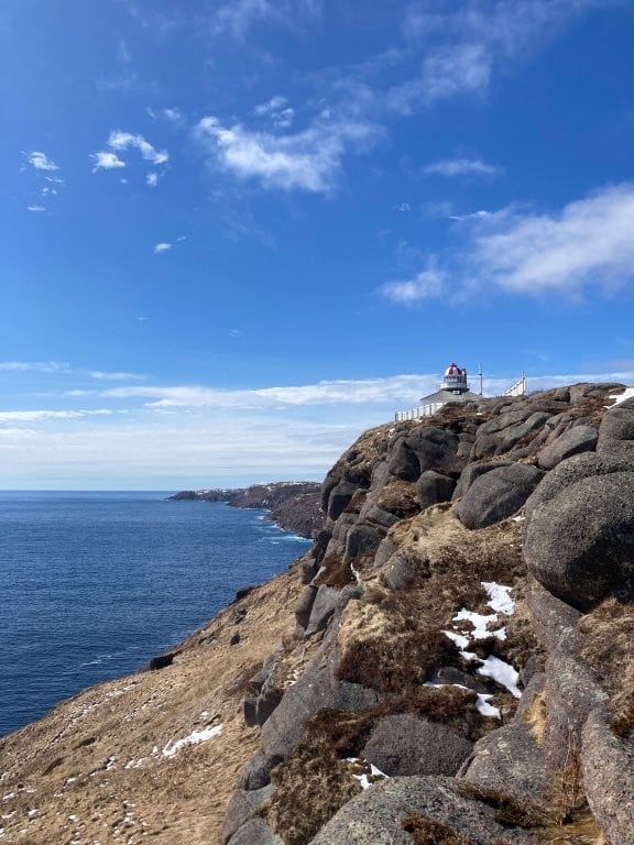 Rocky coastline with a lighthouse at the end