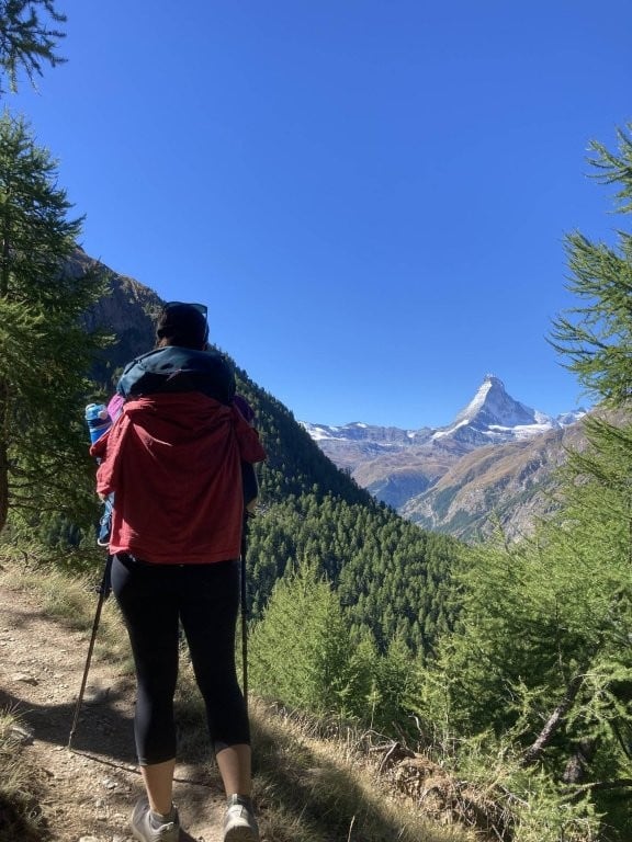 Woman hiking with the Matterhorn in the background