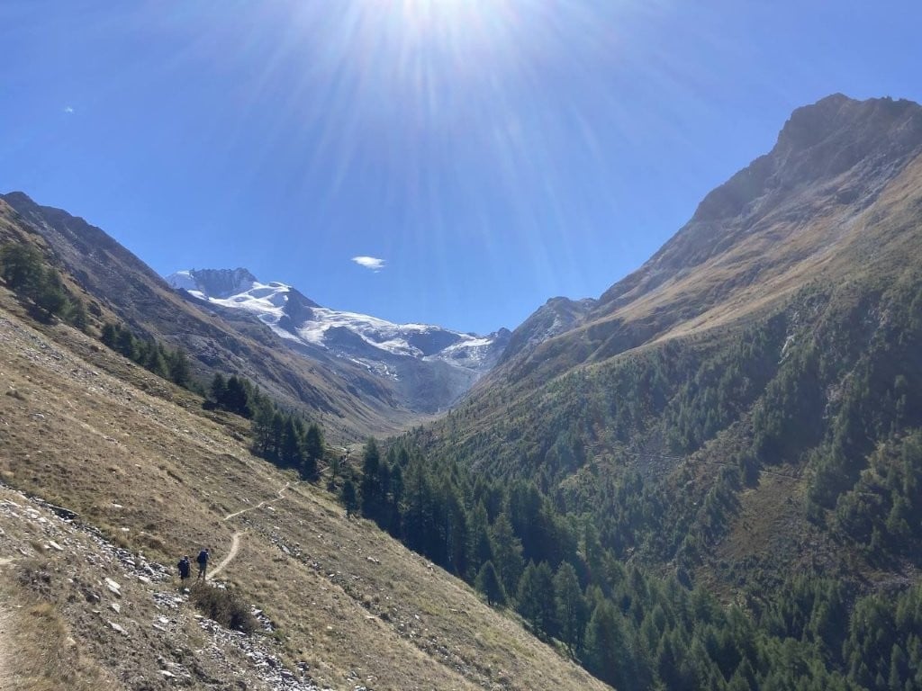Hikers on a sidehill trail on the Walker's Haute Route