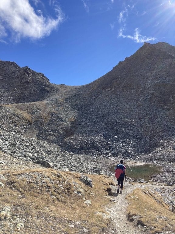 Hiker in a rocky valley
