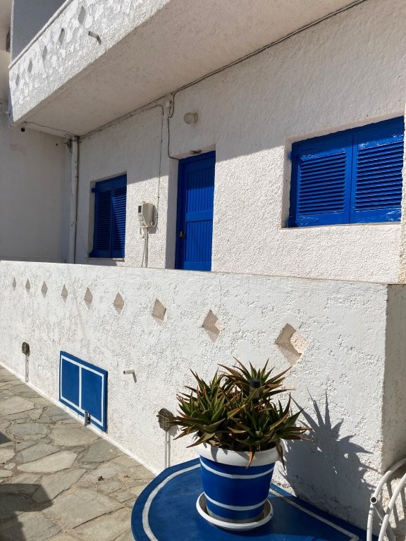 White and blue building in Greece