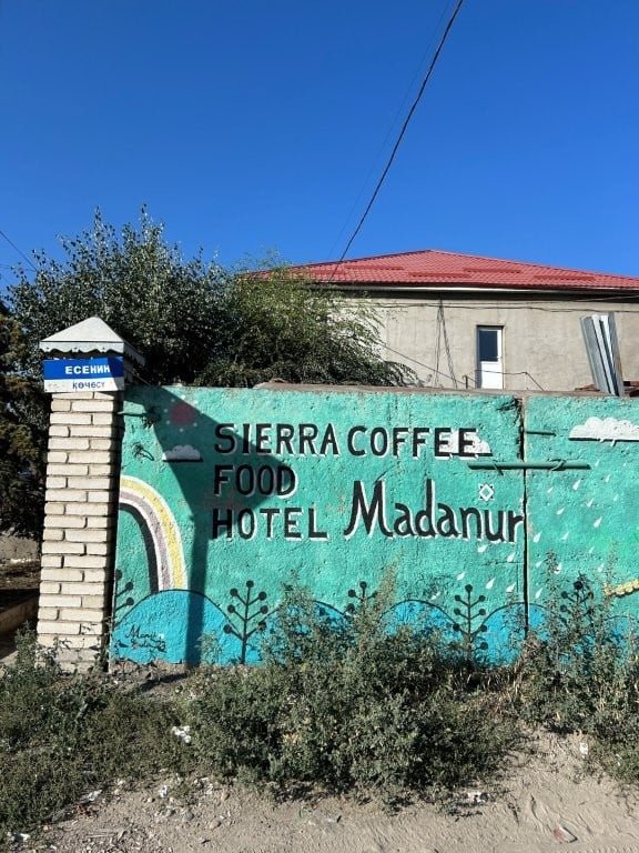 Street art with the name of a Karakol hotel