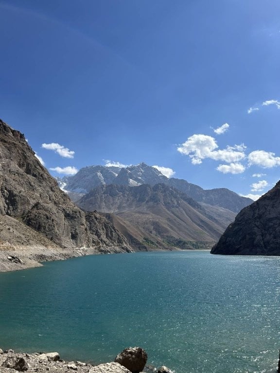 Alpine lake with mountain background