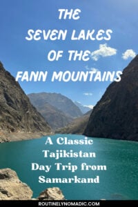 A calm lake surrounded by mountains - Pinterest pin